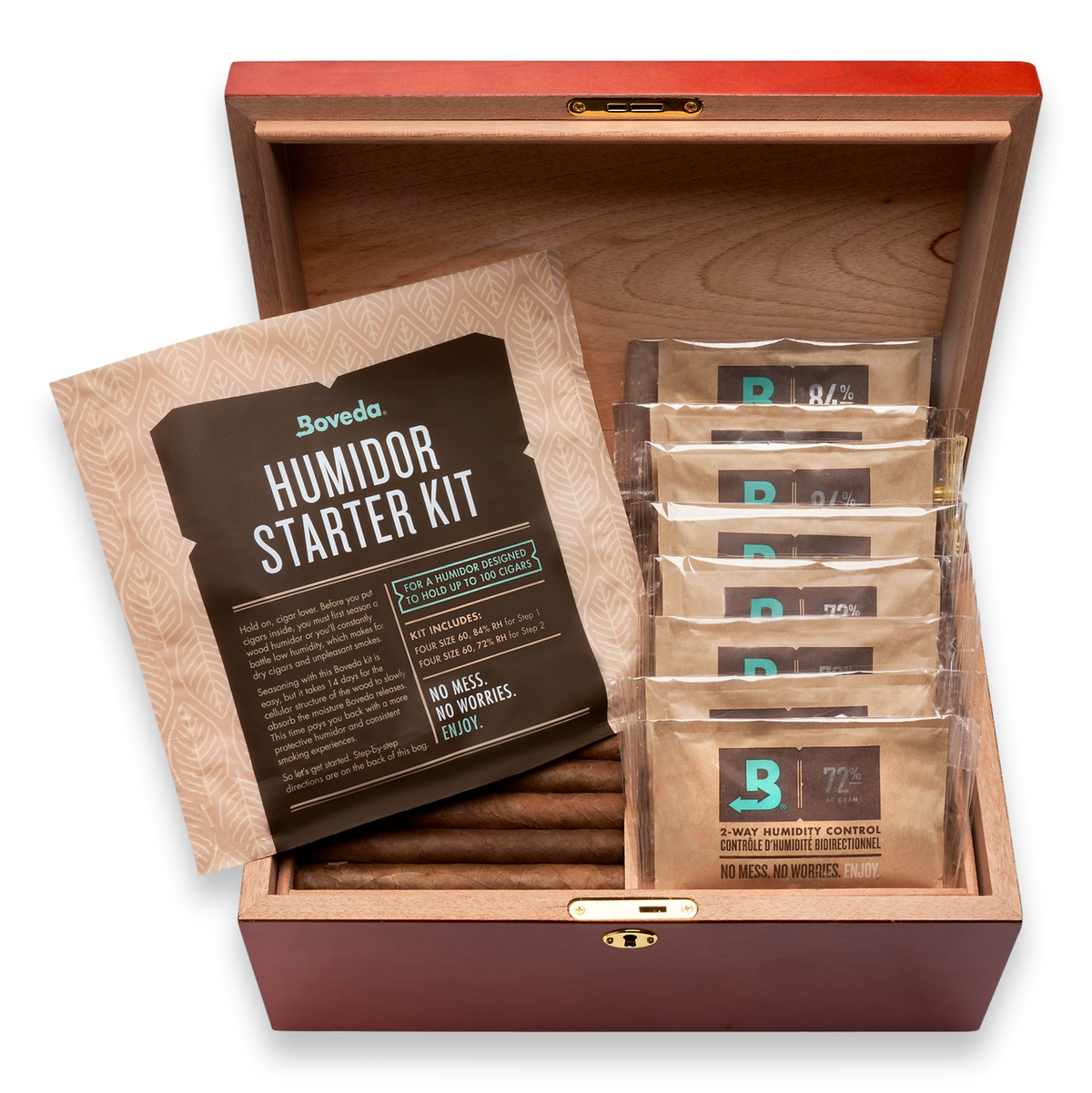 Boveda Humidor Starter Kit pouch with 84% seasoning packs and 72% maintenance packs inside an open wood humidor